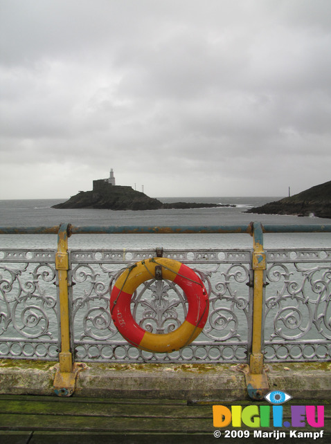 SX09938-9 Life buoy on Mumbles pier and Mumbles Head Lighthouse copy